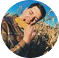 profile picture of man eating sandwich